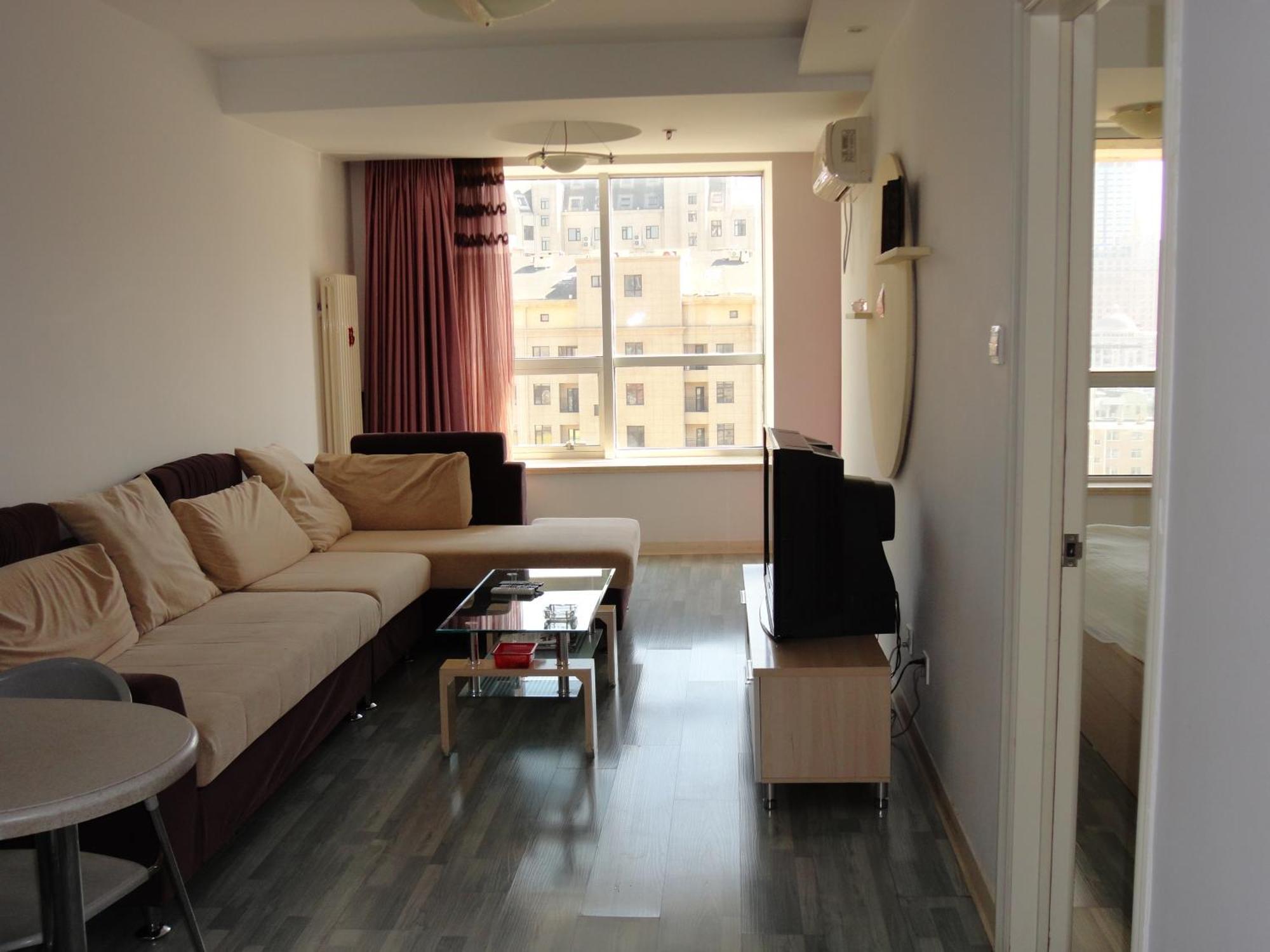 Dalian Xiuzhu Mansion Apartment Номер фото